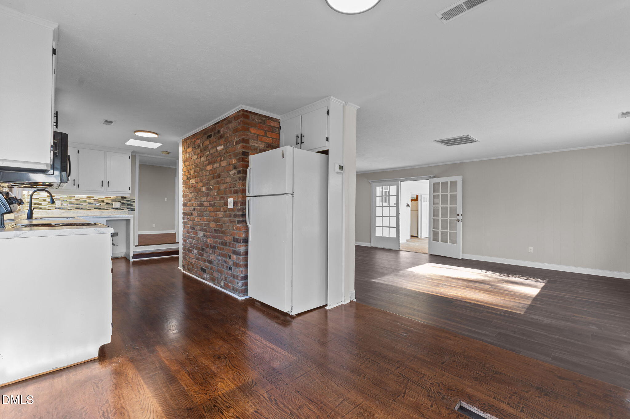 6522 Blake Street Stedman, NC 28391 - Photo 15 of 52 a view of kitchen with furniture and wooden floor