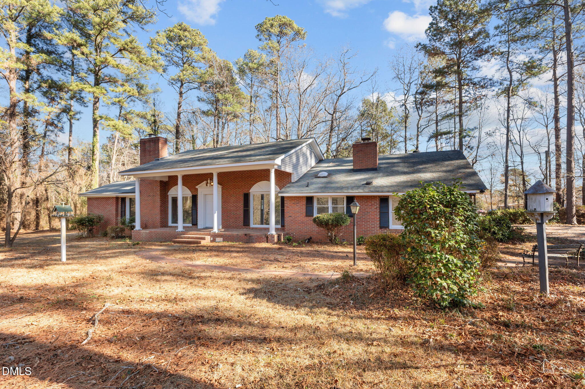 6522 Blake Street Stedman, NC 28391 - Photo 2 of 52 a view of a house with a yard and sitting area