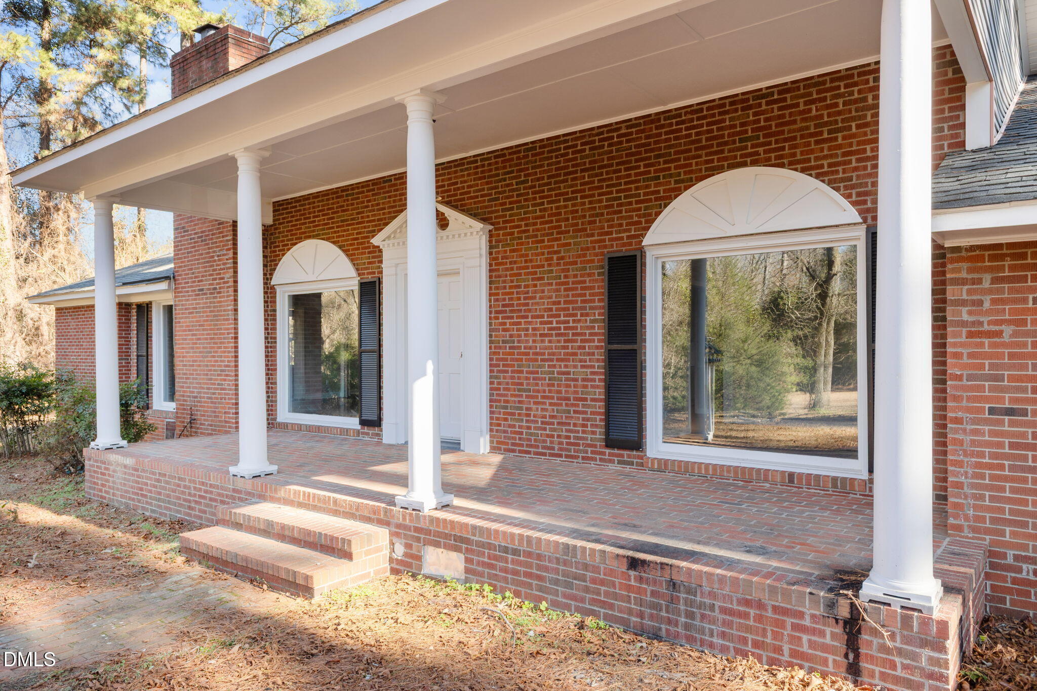 6522 Blake Street Stedman, NC 28391 - Photo 3 of 52 a front view of a house with a porch