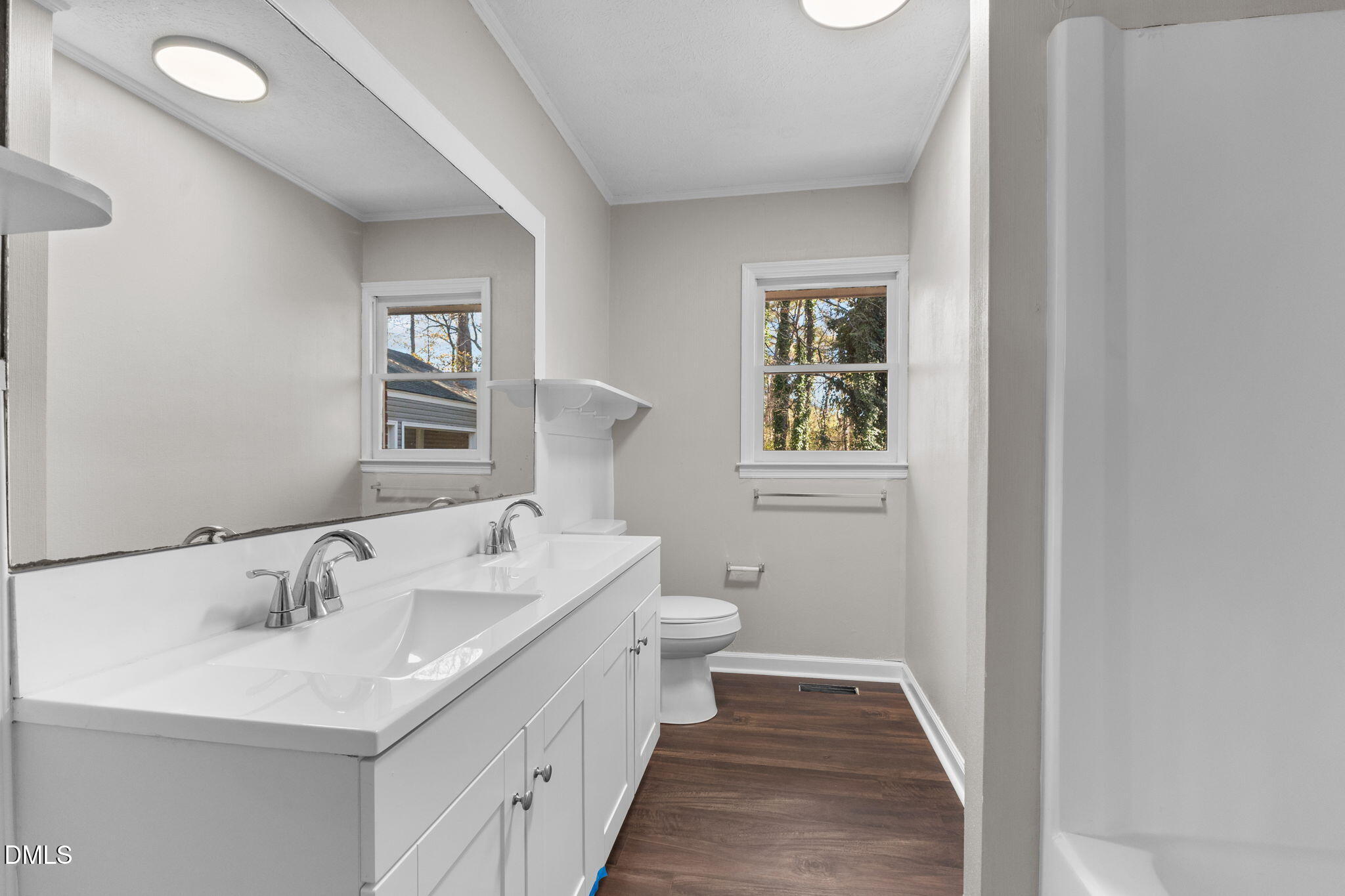 6522 Blake Street Stedman, NC 28391 - Photo 32 of 52 a bathroom with a sink and a window