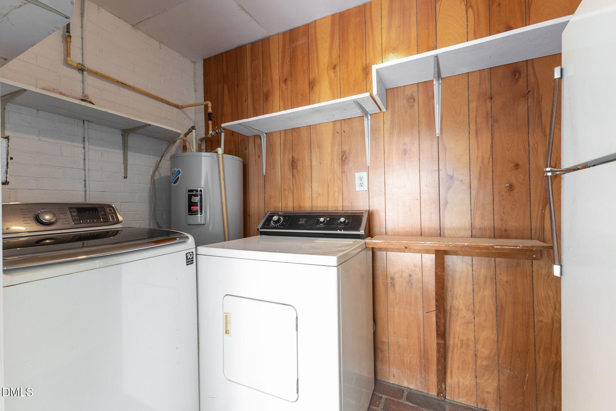 6522 Blake Street Stedman, NC 28391 - Photo 36 of 52 a utility room with dryer and washer