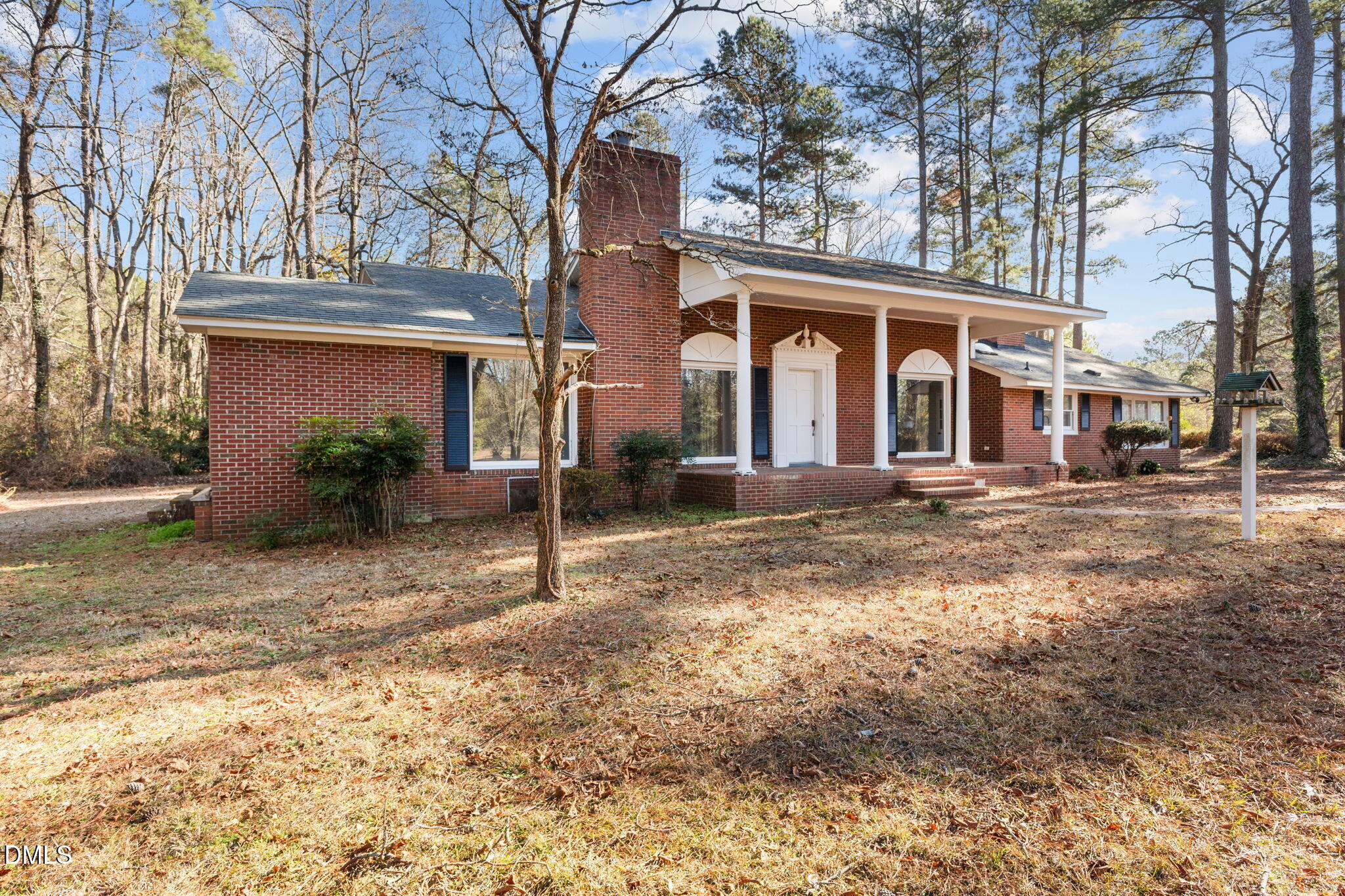 6522 Blake Street Stedman, NC 28391 - Photo 39 of 52 a front view of a house with a yard and garage