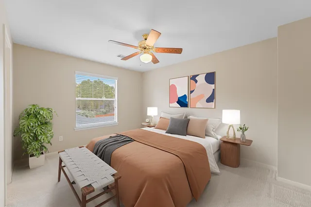 an aerial view of residential houses with outdoor space