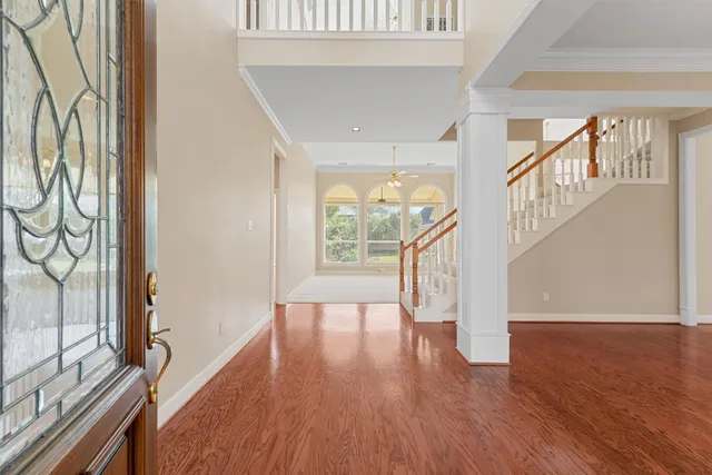 a view of a kitchen with a dishwasher and a large window