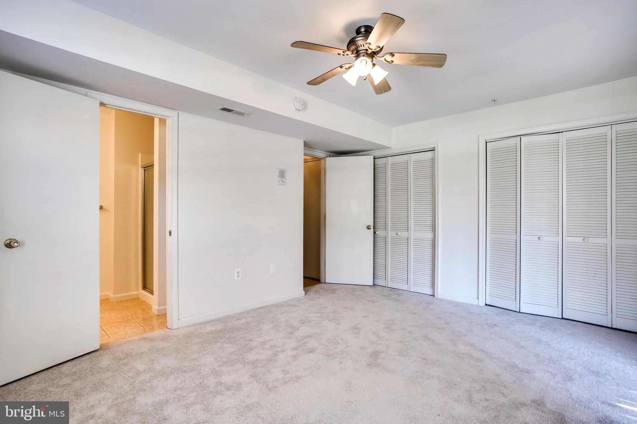 100 Penwick Circle Frederick, MD 21702 - Photo 13 of 18 a view of empty room with a ceiling fan