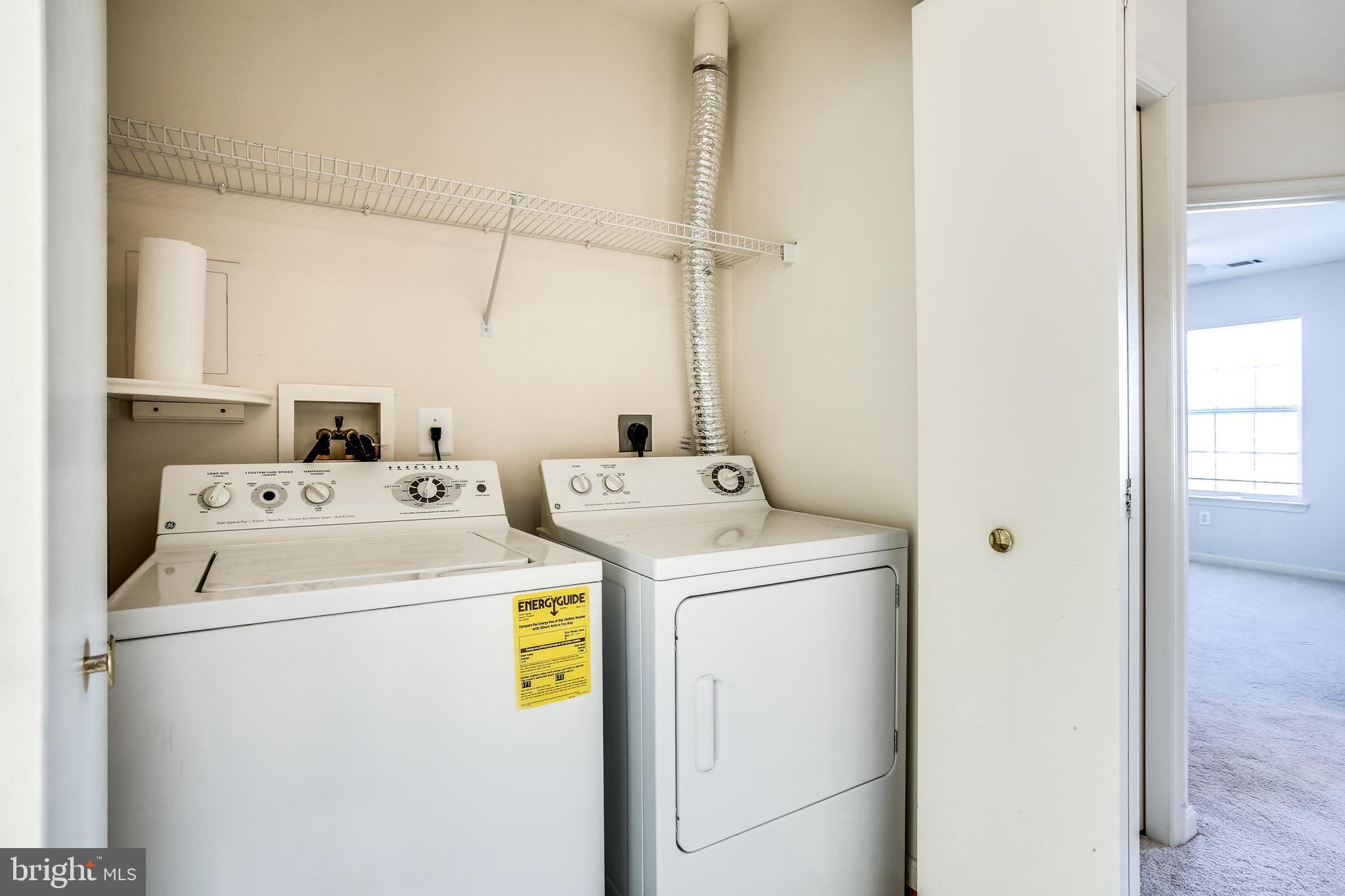 100 Penwick Circle Frederick, MD 21702 - Photo 16 of 18 a utility room with dryer and washer
