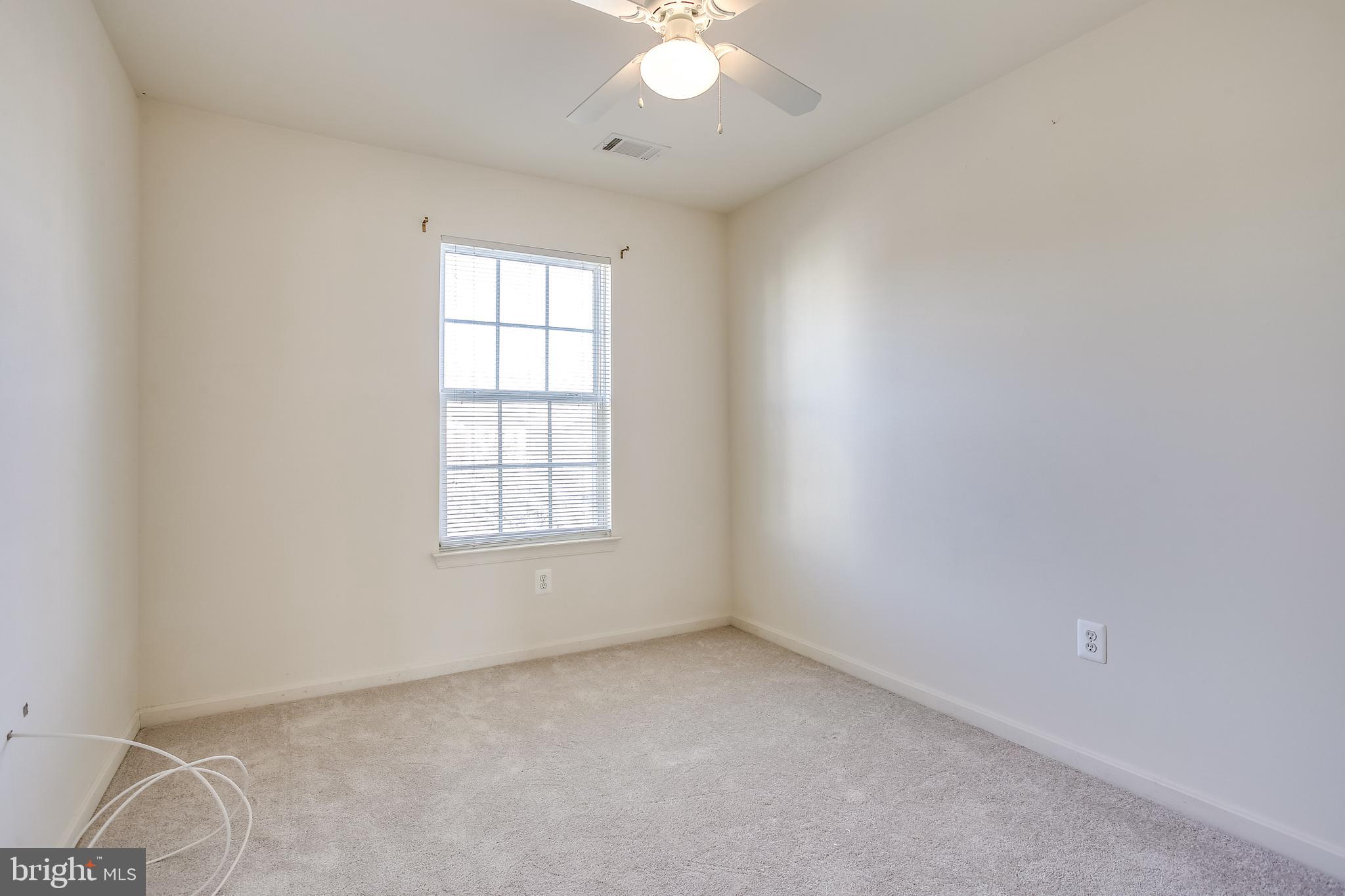 100 Penwick Circle Frederick, MD 21702 - Photo 10 of 18 an empty room with a window