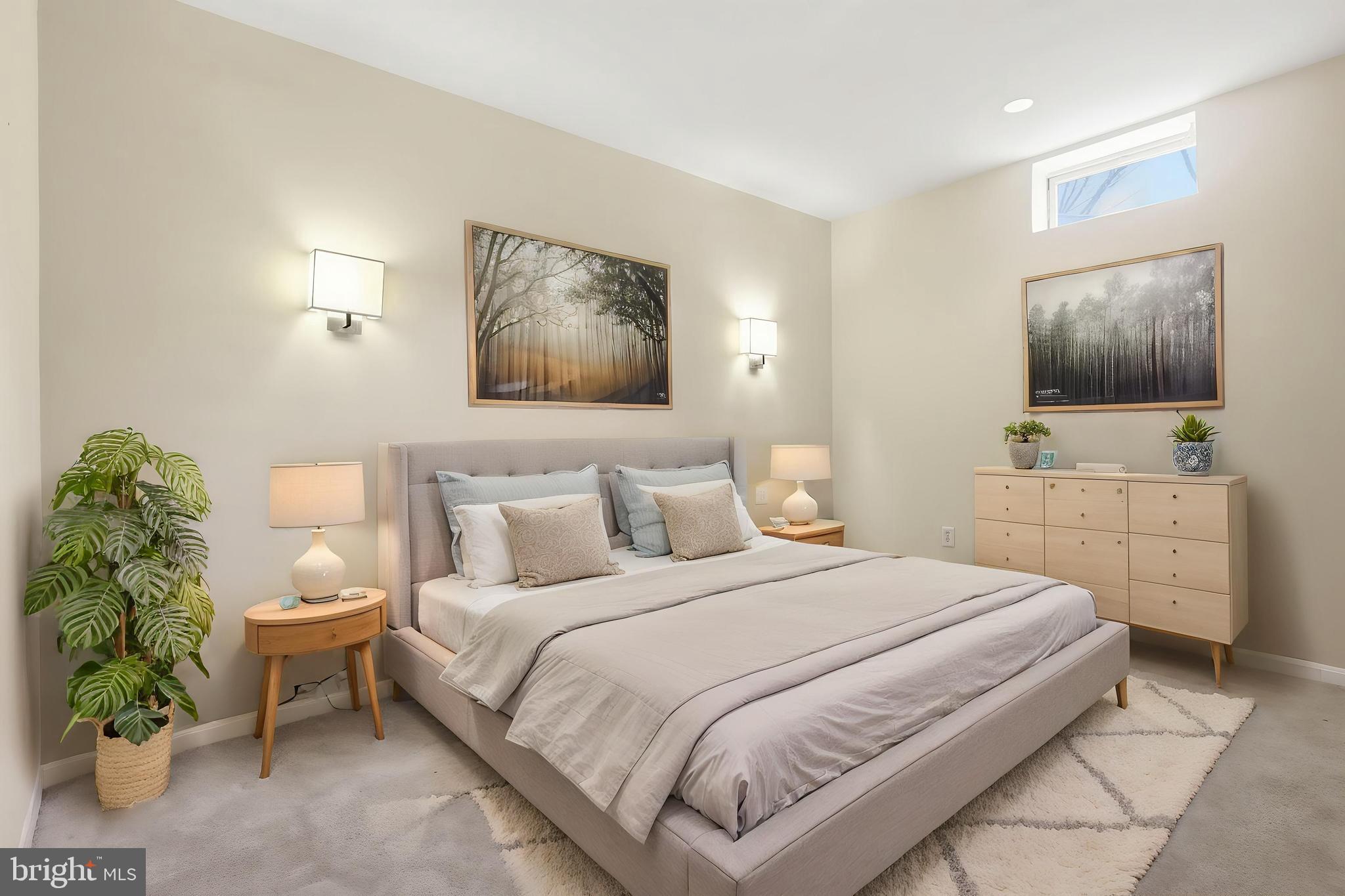 19617 Edgemont Square Ashburn, VA 20147 - Photo 45 of 65 a bedroom with a bed and a flat screen tv