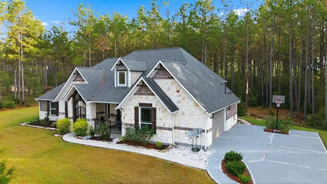 $699,000 | 15516 Frst Grv Drive, Willis, TX 77378