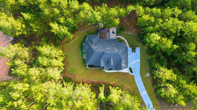 a view of swimming pool with a yard