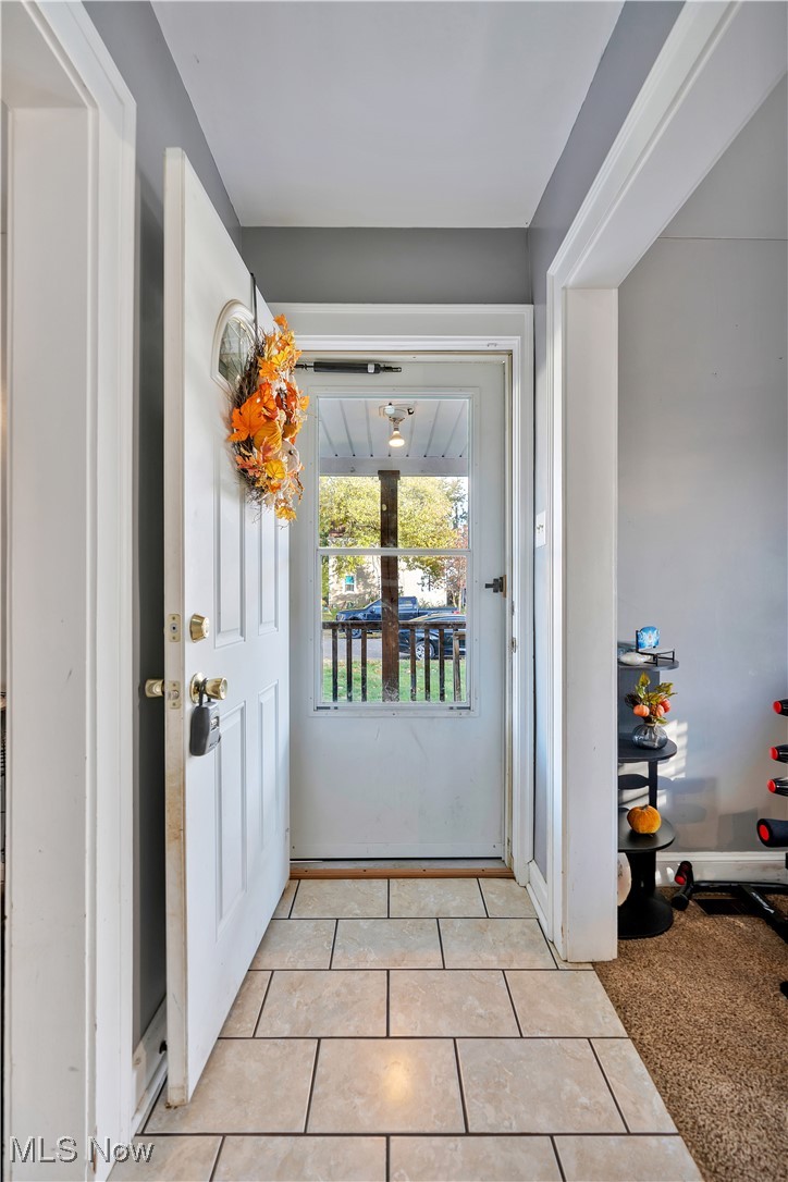 1361 Crescent Road Southwest Canton, OH 44710 - Photo 3 of 36 Entrance foyer with light tile patterned floors