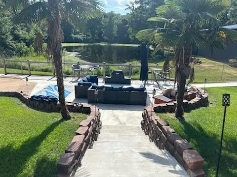 a view of a garden with patio