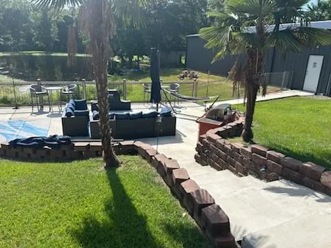 a view of yard with patio