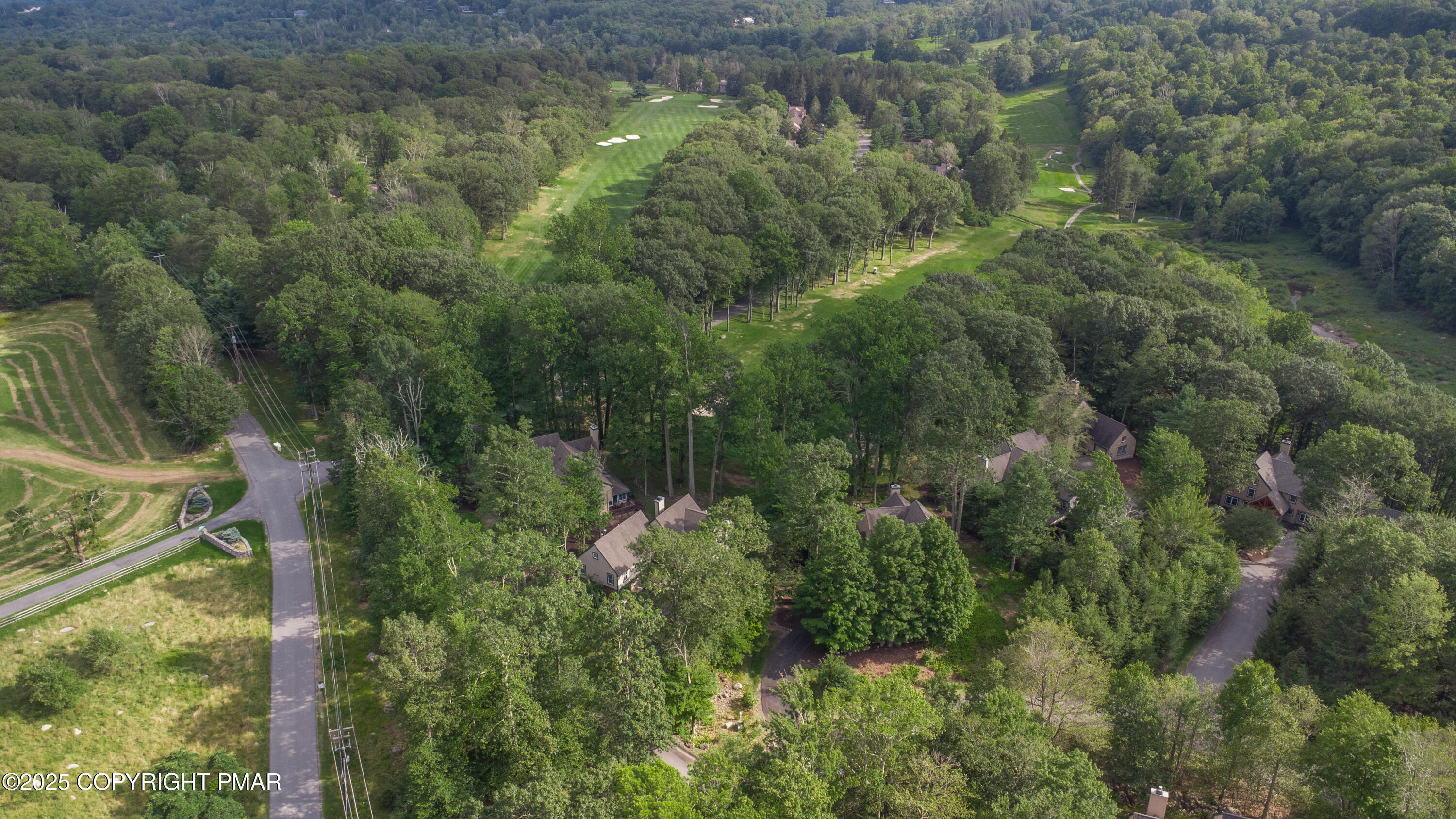 Creekside Road Canadensis, PA 18325 - Photo 12 of 23 an aerial view of residential houses with outdoor space and trees