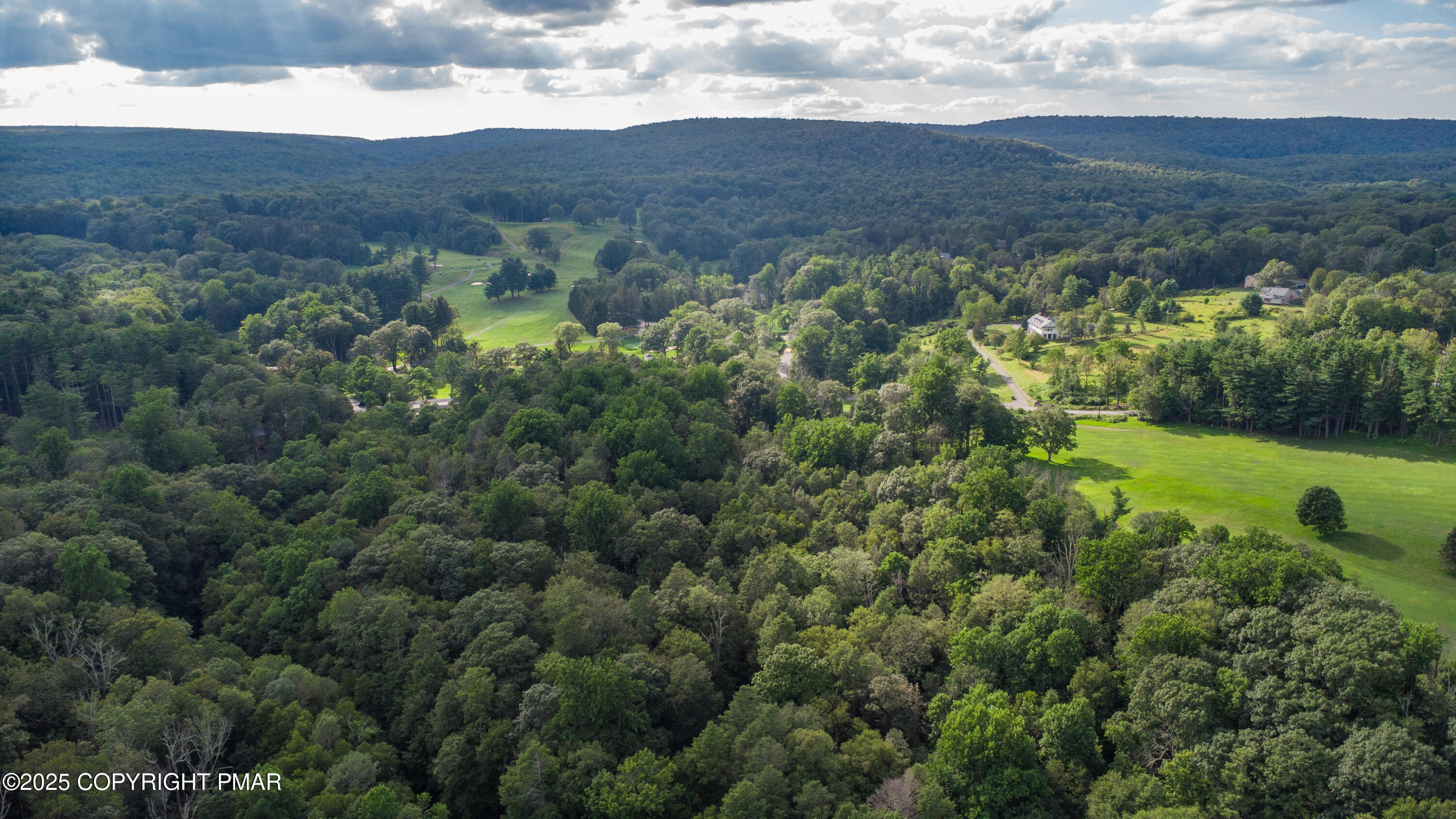 Creekside Road Canadensis, PA 18325 - Photo 20 of 22 an aerial view of residential houses with outdoor space and trees