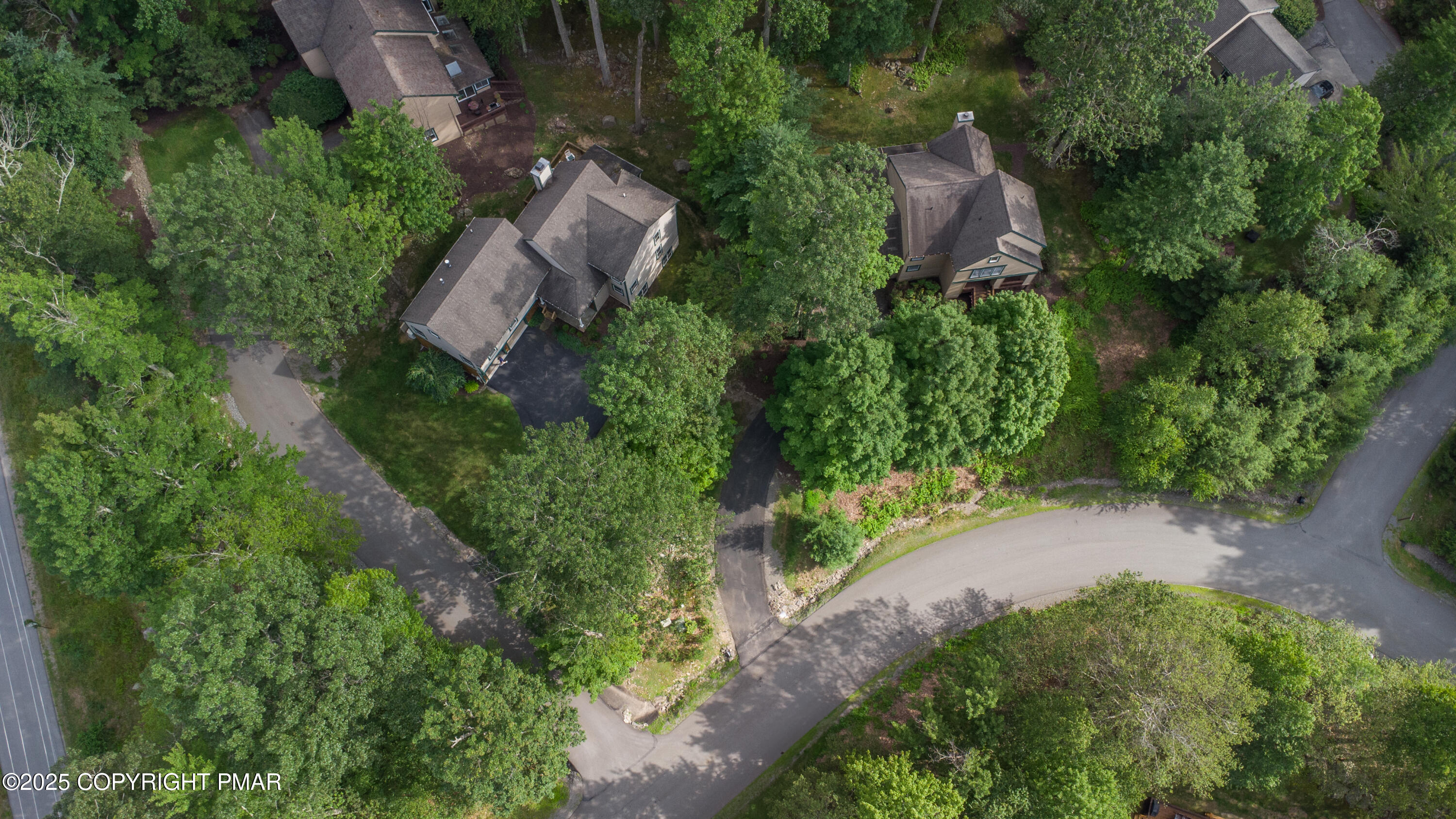 Creekside Road Canadensis, PA 18325 - Photo 9 of 22 an aerial view of a house with a yard and large trees