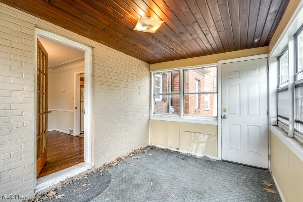 13677 Cedar Road Cleveland, OH 44118 - Photo 21 of 50 Unfurnished sunroom featuring plenty of natural light