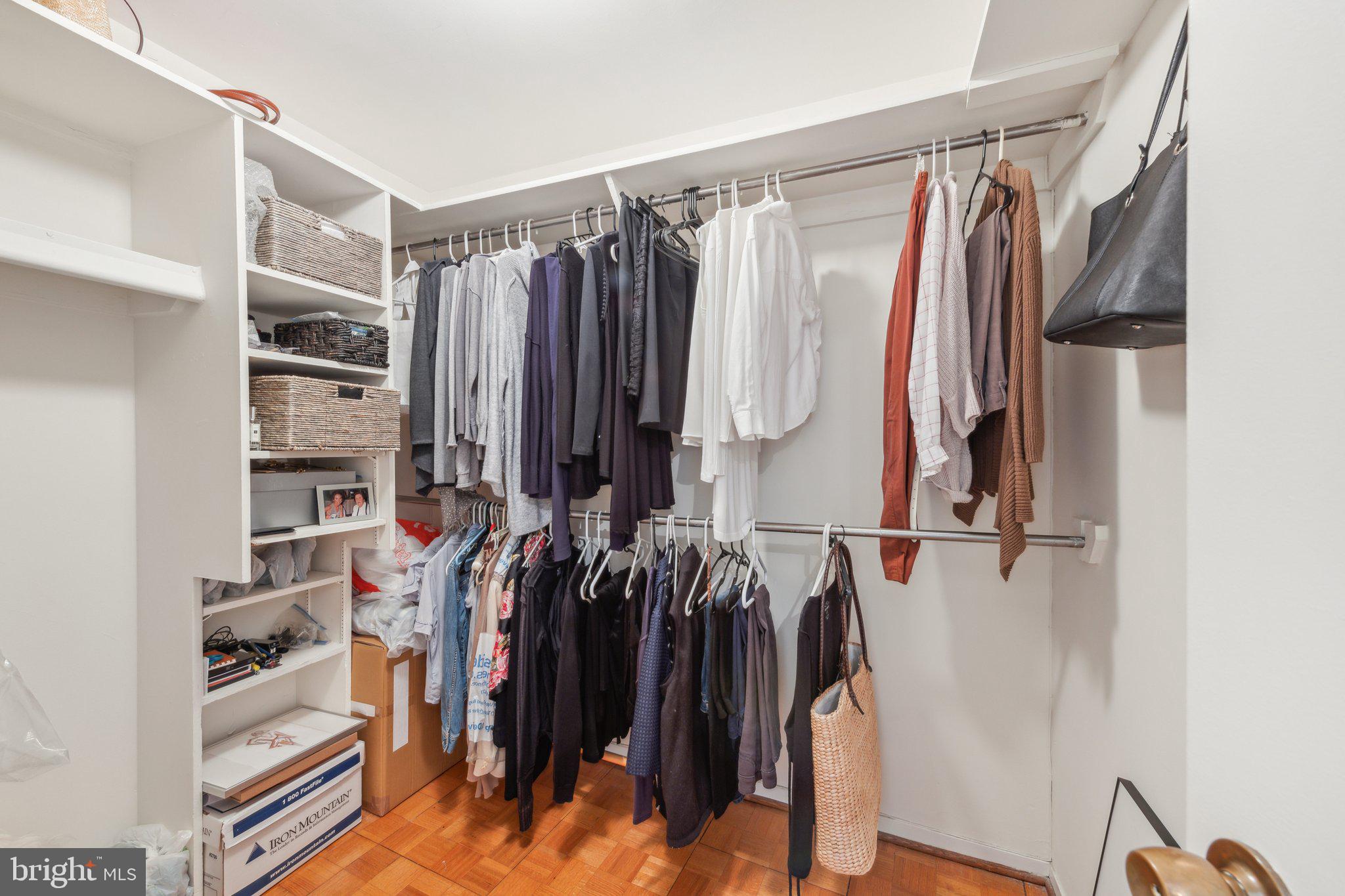 2510 Virginia Avenue Northwest, Unit 2BN Washington, DC 20037 - Photo 19 of 21 a view of walk in closet with clothes