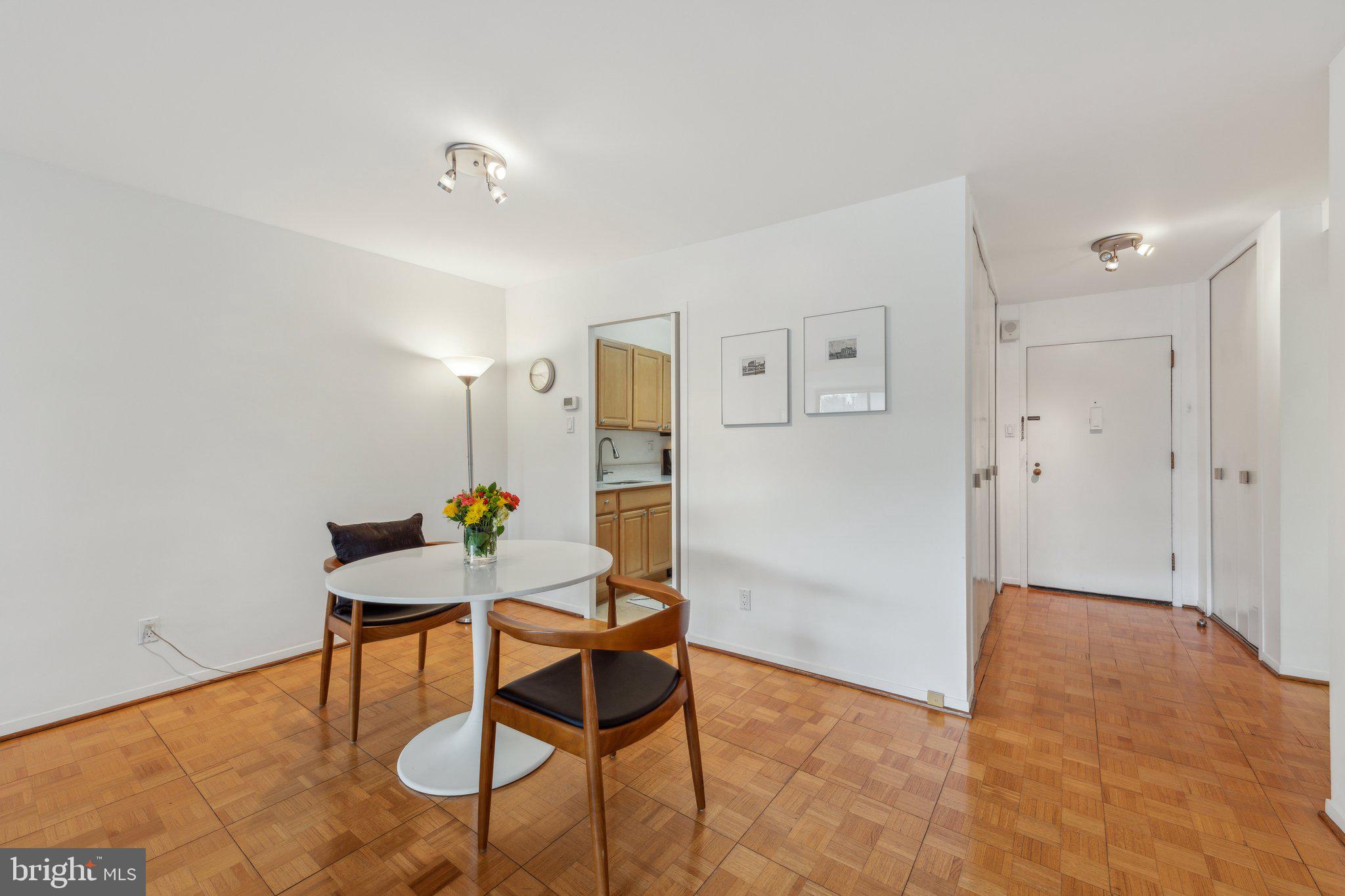 2510 Virginia Avenue Northwest, Unit 2BN Washington, DC 20037 - Photo 10 of 21 a workspace room with furniture and wooden floor