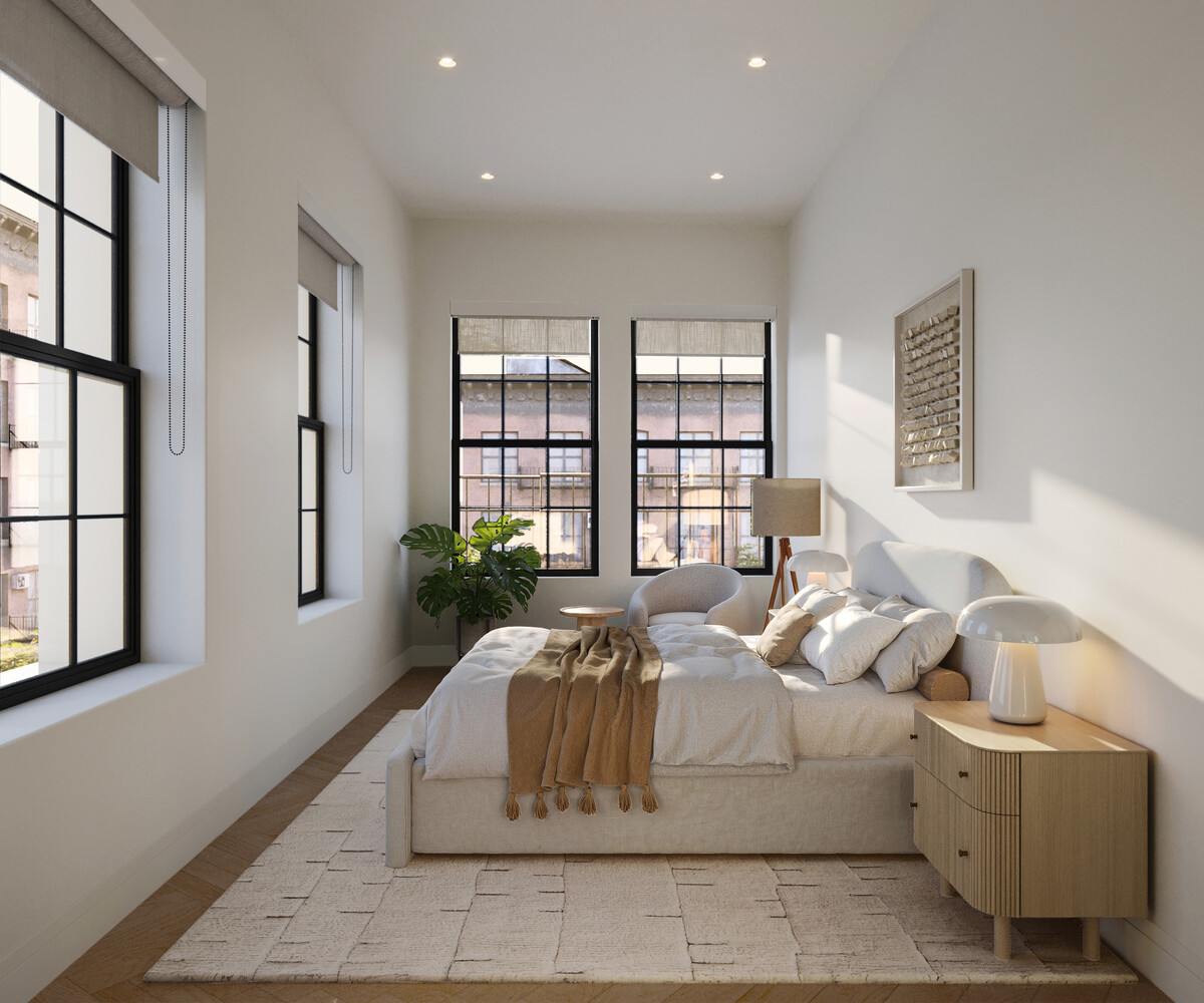 84 University Place, Unit 4 Manhattan, NY 10003 - Photo 7 of 11 a living room with furniture large window and wooden floor