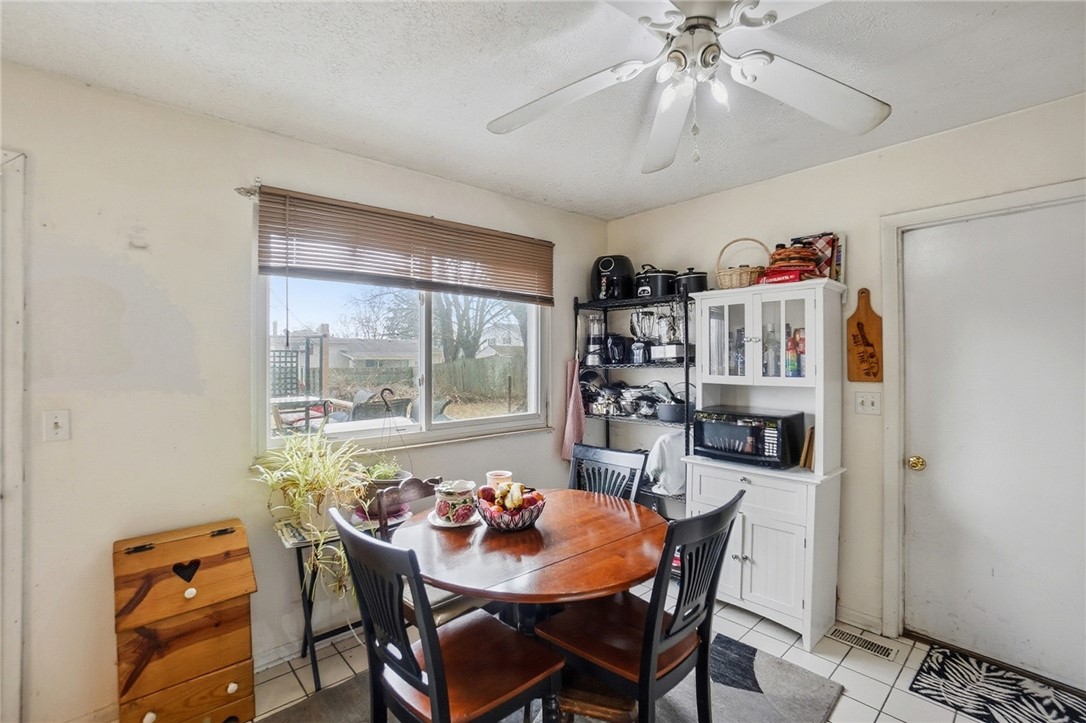 4780 Old Salem Road Englewood, OH 45322 - Photo 11 of 30 This bright kitchen area features ample natural light and a practical layout for daily living.
