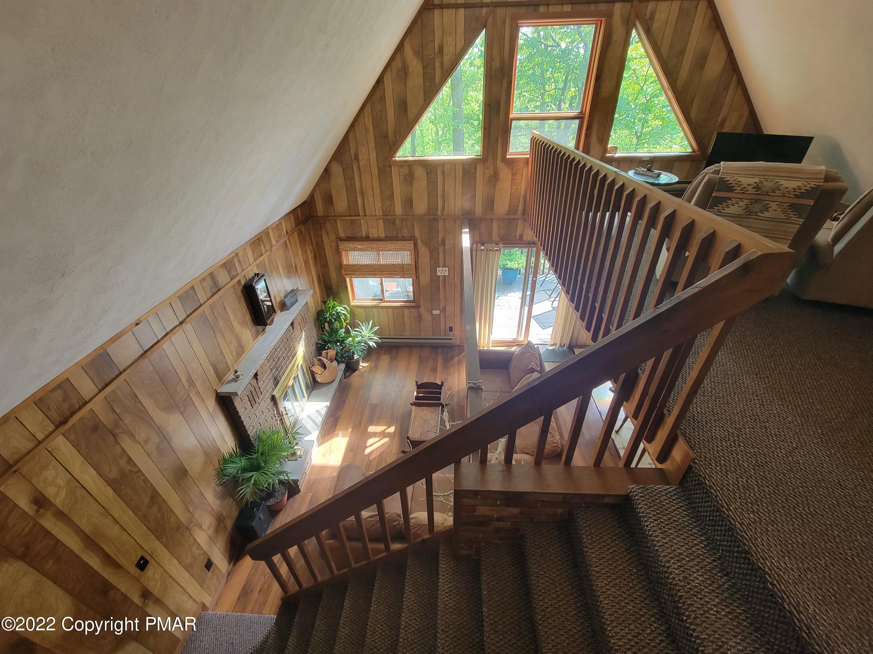 358 Brentwood Drive Bushkill, PA 18324 - Photo 12 of 59 a view of entryway and hall with wooden floor