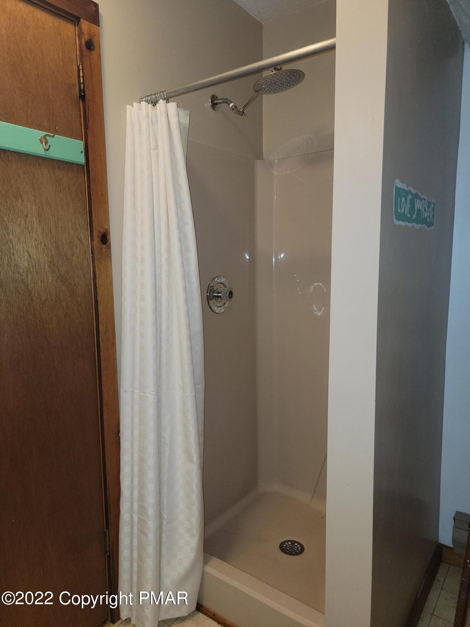 358 Brentwood Drive Bushkill, PA 18324 - Photo 23 of 59 a bathroom with a shower