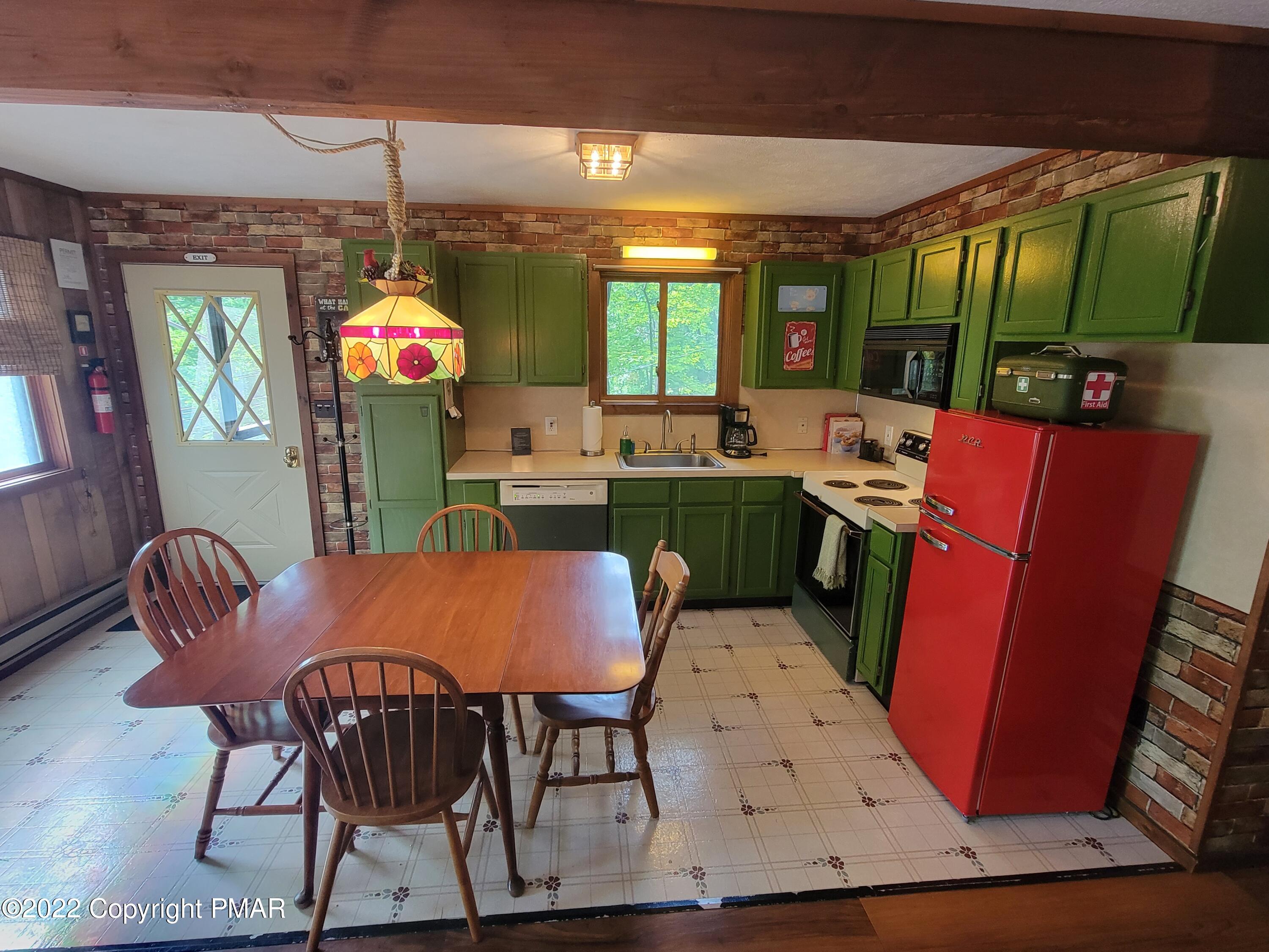 358 Brentwood Drive Bushkill, PA 18324 - Photo 3 of 59 a view of a dining room with furniture window and outside view