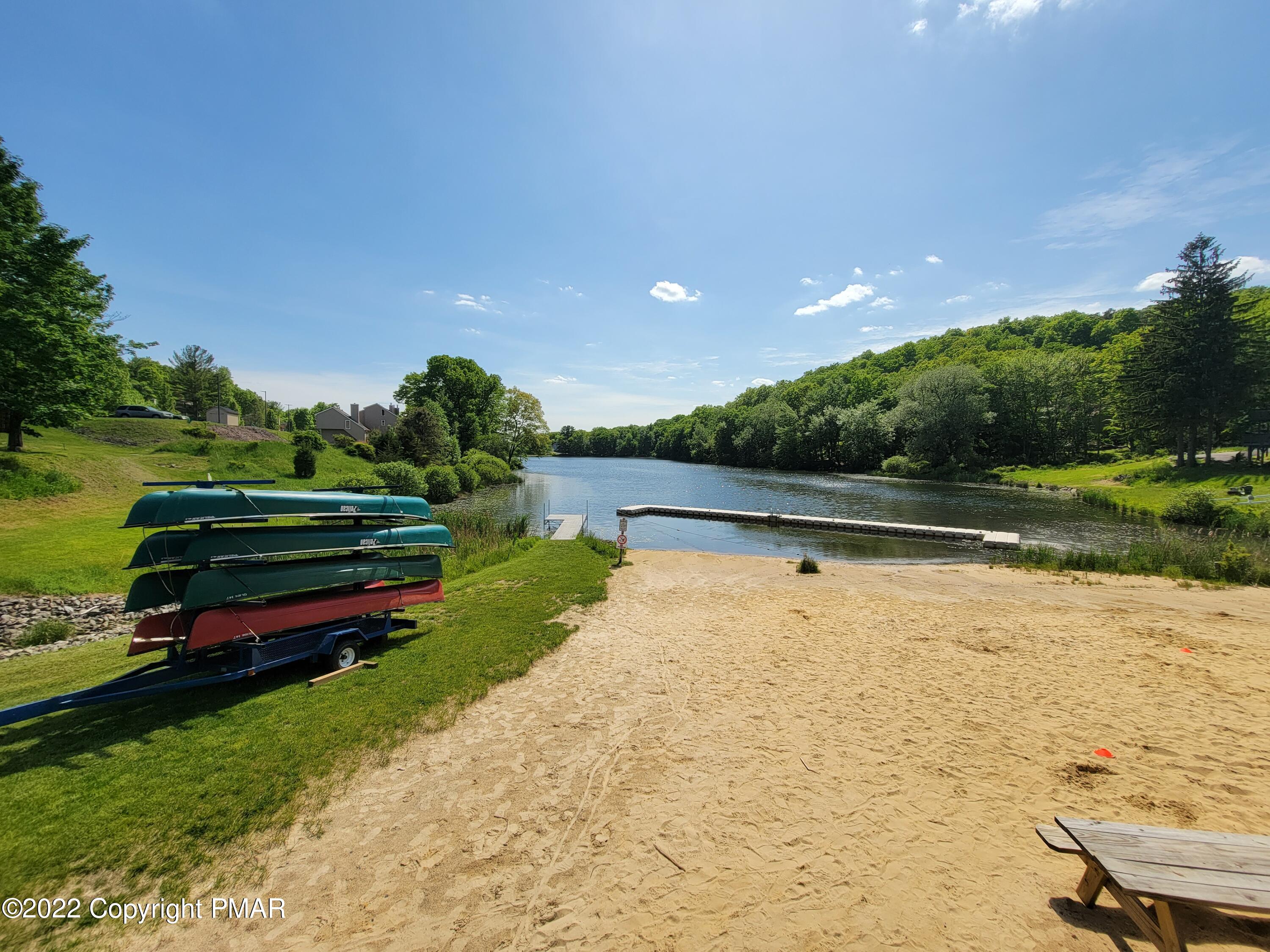 358 Brentwood Drive Bushkill, PA 18324 - Photo 50 of 59 a view of a lake with a park
