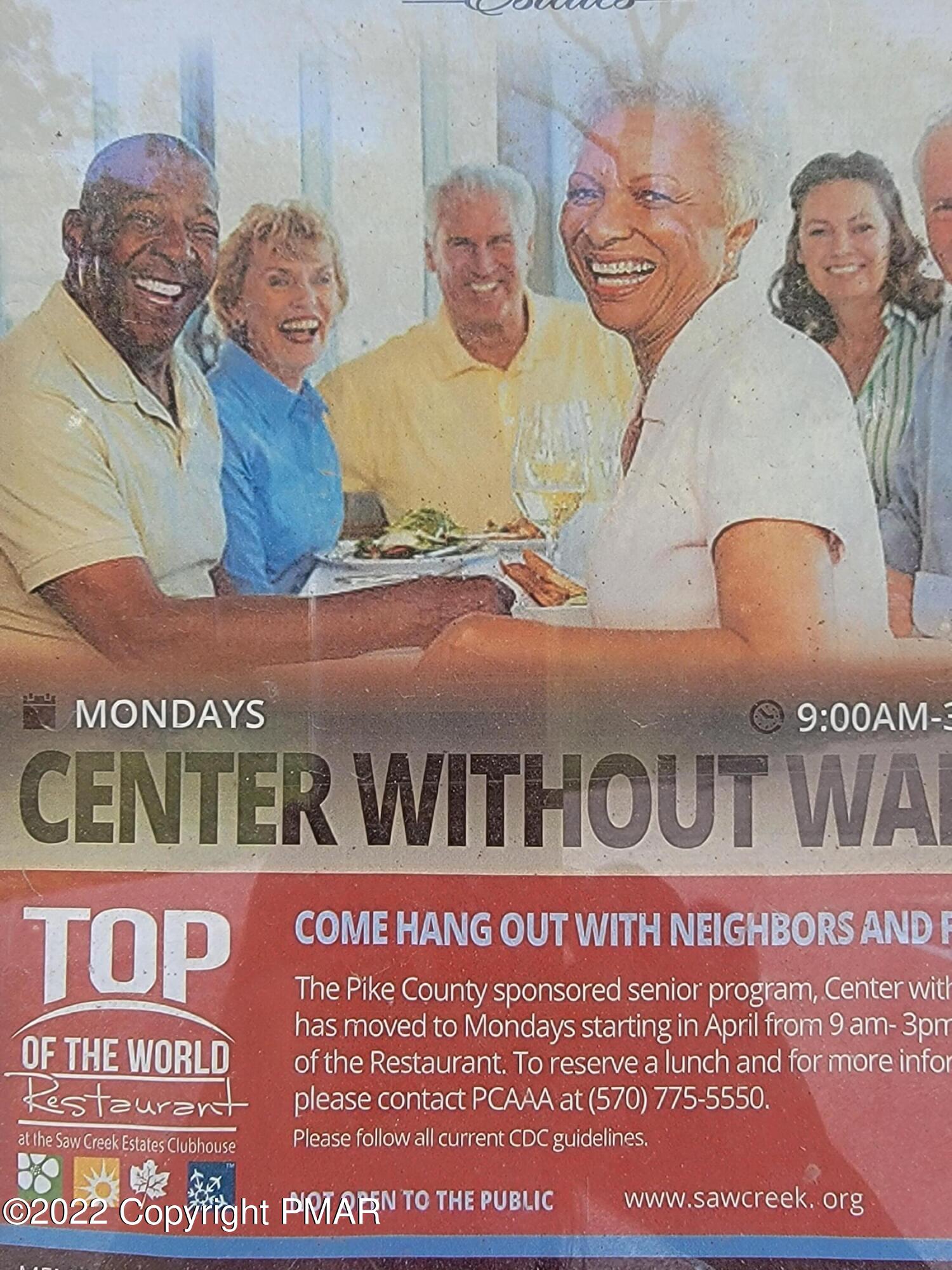 358 Brentwood Drive Bushkill, PA 18324 - Photo 55 of 59 a front view of multi story residential apartment building with retail shop