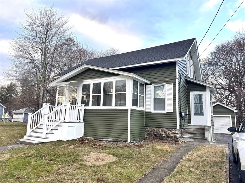 9 Idalla Avenue Worcester, MA 01606 - Photo 3 of 16 a view of a house with a yard and sitting area