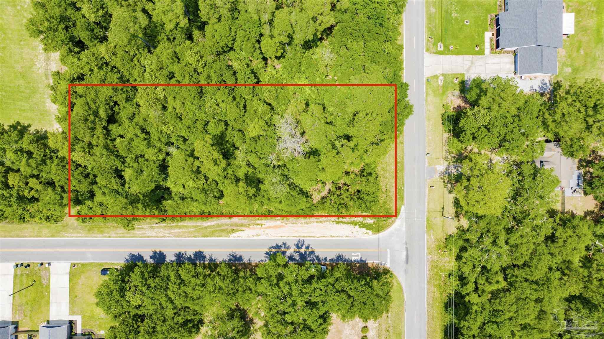 3195 Stefani Road Cantonment, FL 32533 - Photo 1 of 10 a view of a garden with plants