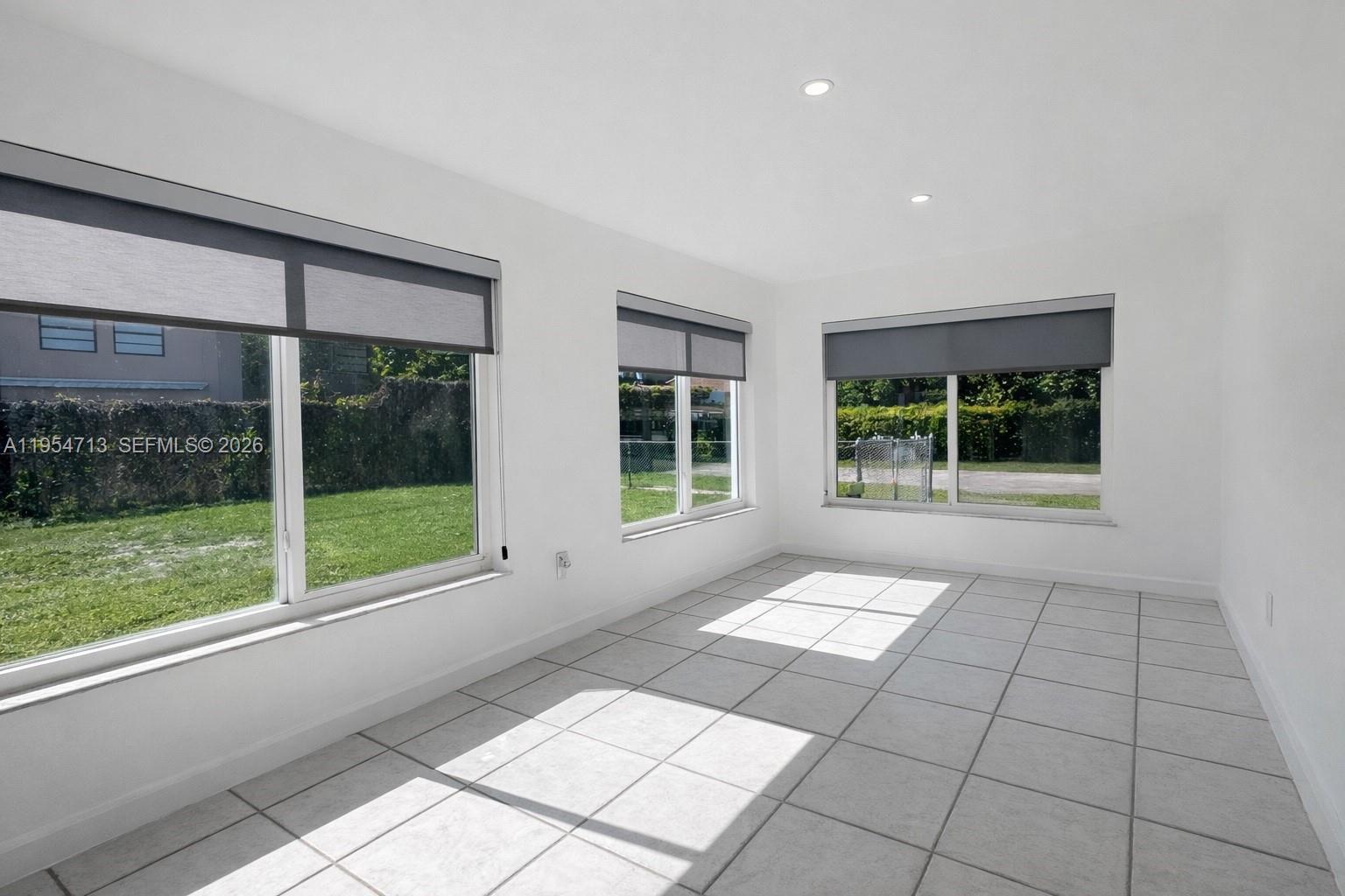 7980 Southwest 37th Terrace, Unit 7980 Miami, FL 33155 - Photo 9 of 14 Florida room