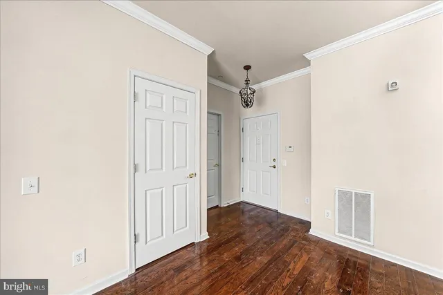 a view of a livingroom with wooden floor