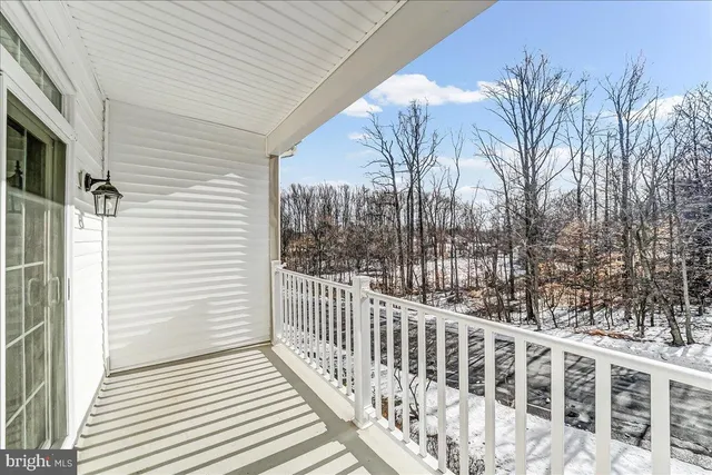 a view of a balcony with a pot