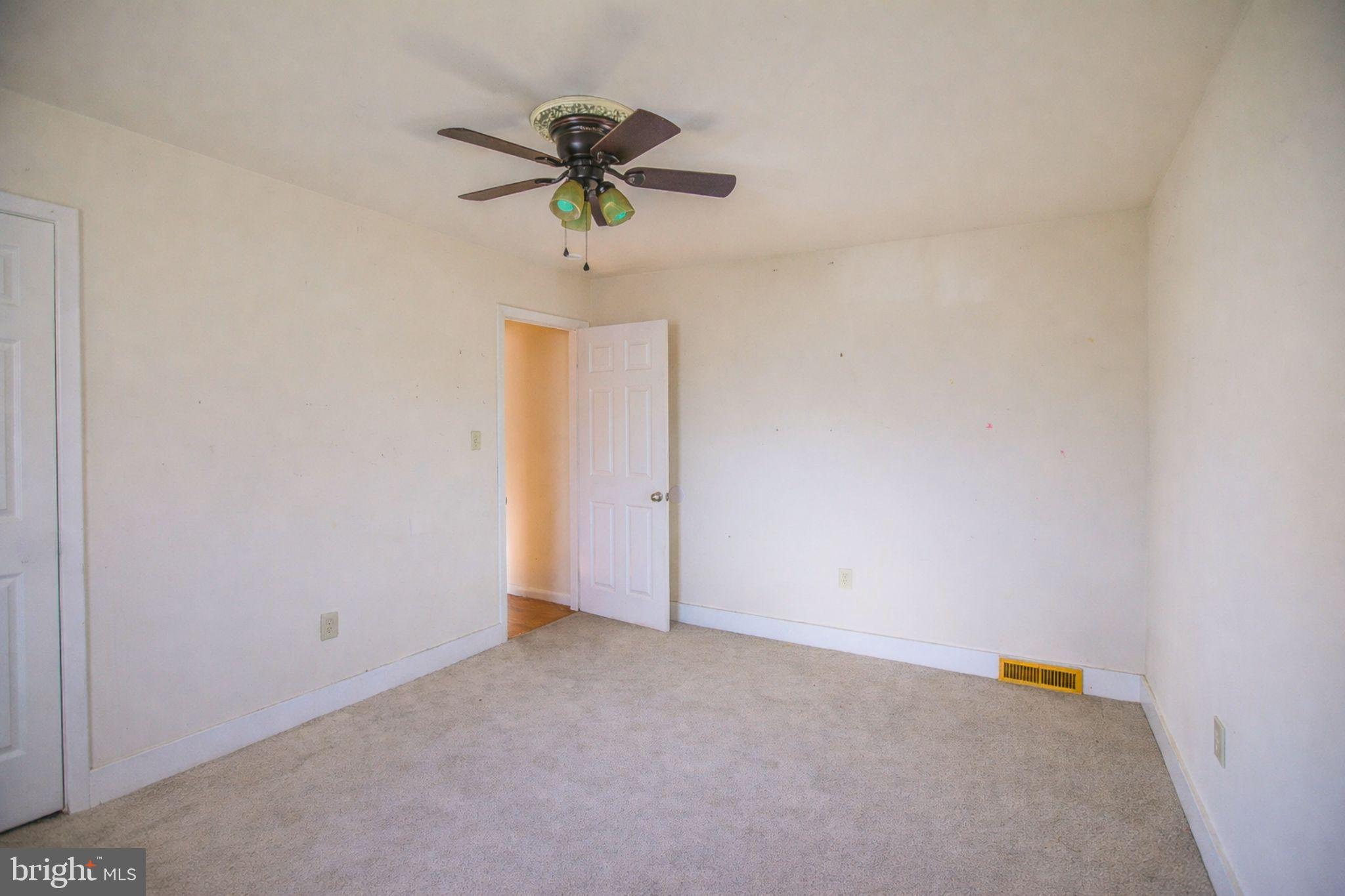 7920 Denton Drive Clinton, MD 20735 - Photo 25 of 34 a view of a room with a ceiling fan