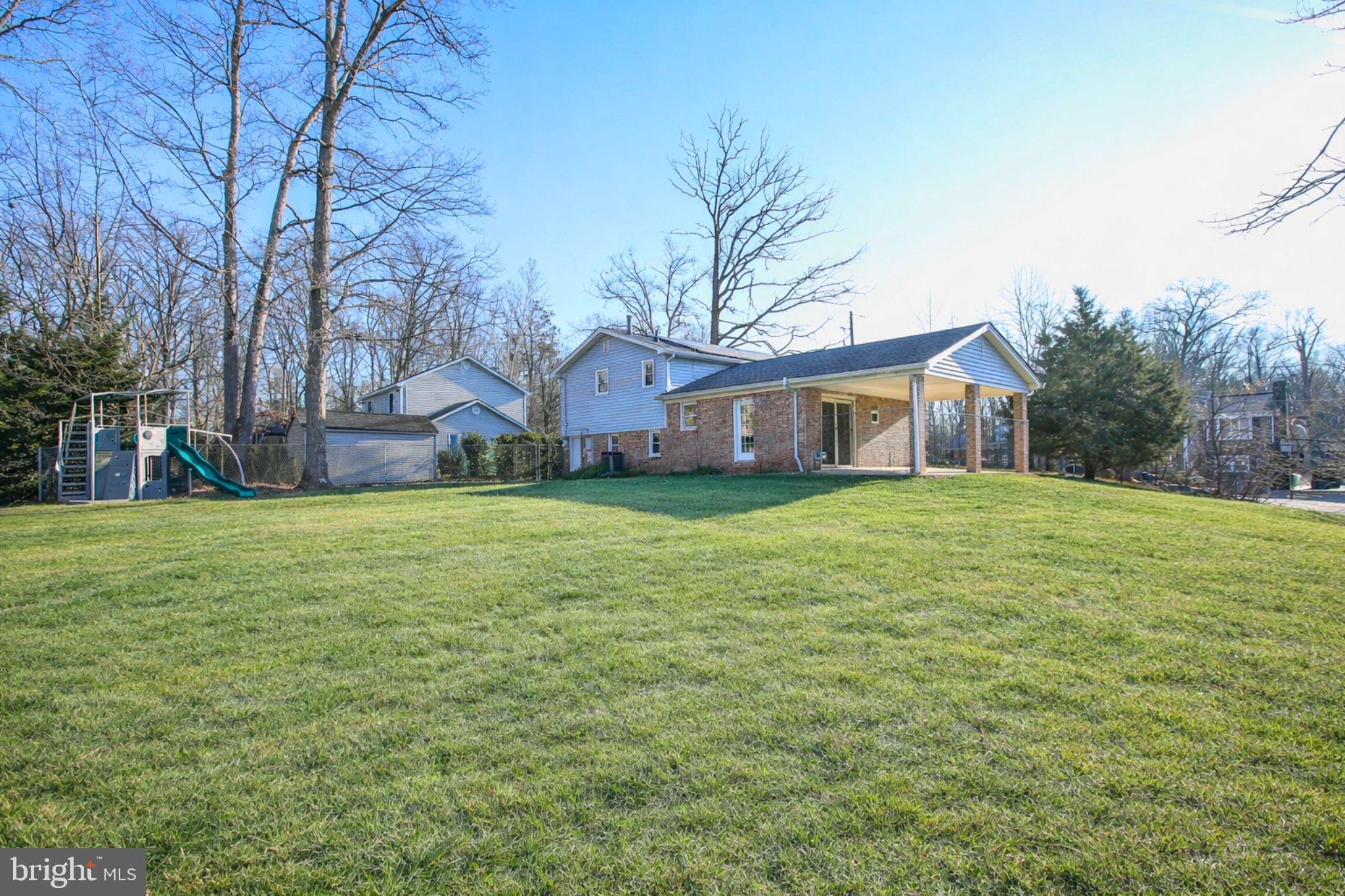 7920 Denton Drive Clinton, MD 20735 - Photo 33 of 34 a house view with swimming pool in front of it