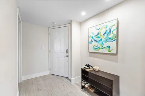 a room with painting on the wall and a painting on the wall