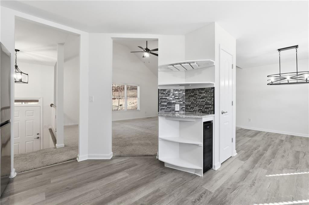 432 Barrel Way Ball Ground, GA 30107 - Photo 13 of 50 wooden floor view of an empty room and wooden floor