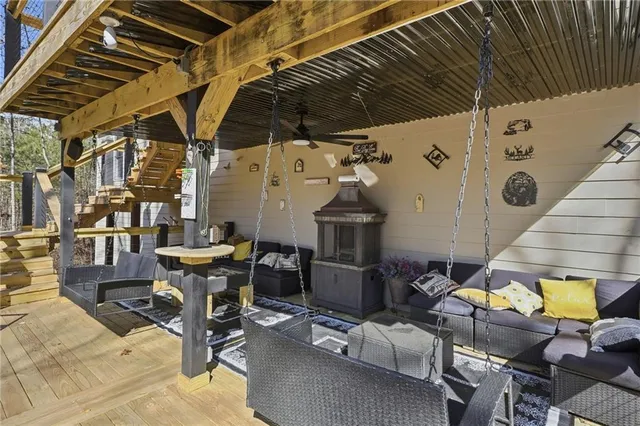 a view of a house with a chairs in a patio