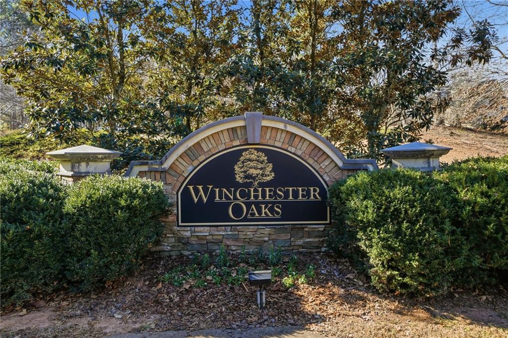 432 Barrel Way Ball Ground, GA 30107 - Photo 45 of 50 a sign broad in front of a red gate