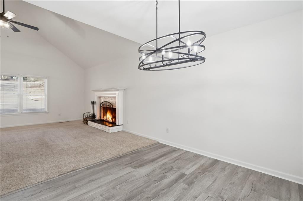 432 Barrel Way Ball Ground, GA 30107 - Photo 6 of 50 a view of a room with window and fireplace