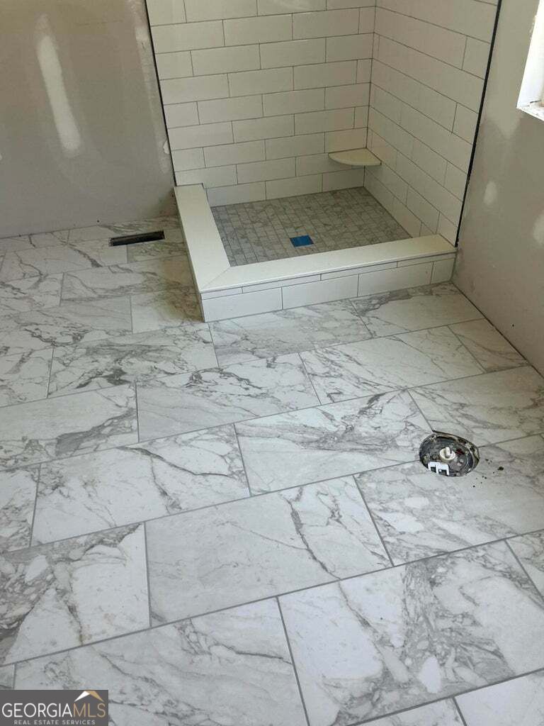 1610 Johnson Road Chickamauga, GA 30707 - Photo 3 of 4 Look at the new flooring and shower!