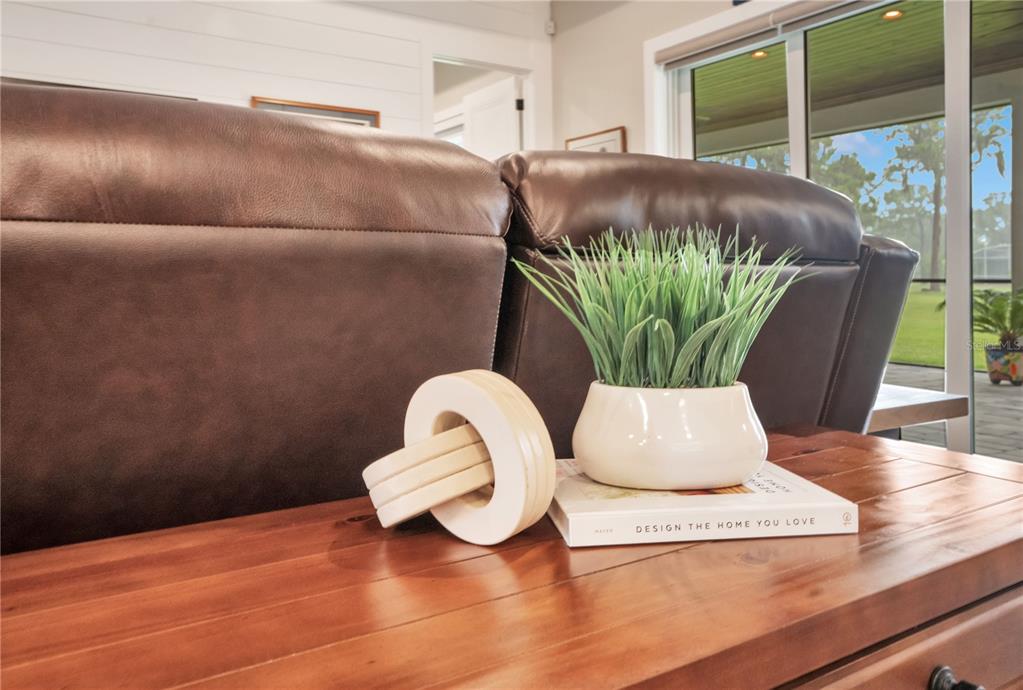 440 Palma Ceia Road Winter Haven, FL 33884 - Photo 21 of 78 a view of table and chair in wooden floor