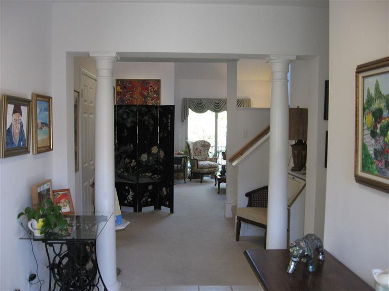 56 Stratford Ridge, Unit 148 Mashpee, MA 02649 - Photo 4 of 29 a living room with furniture
