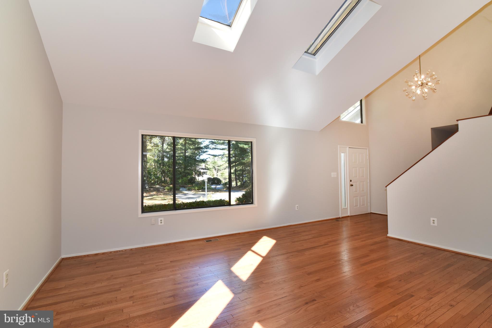11117 Glade Drive Reston, VA 20191 - Photo 23 of 75 Great natural light with skylights in living room.