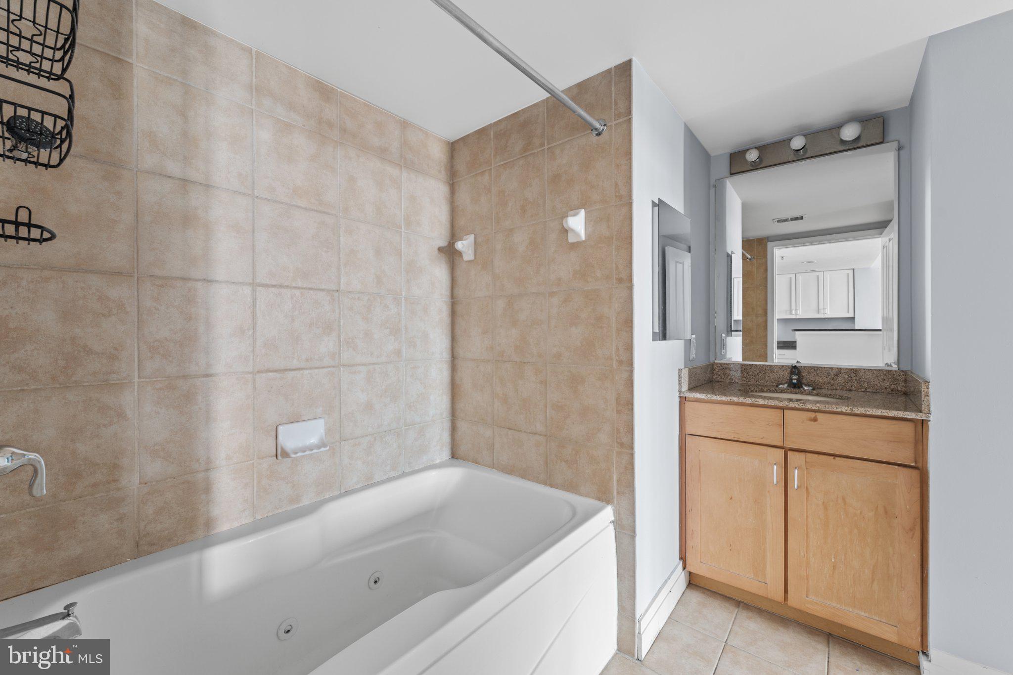 414 Water Street, Unit 1306 Baltimore, MD 21202 - Photo 24 of 29 Modern bathroom with elegant finishes.