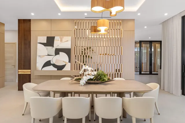 a white refrigerator freezer sitting inside of a kitchen