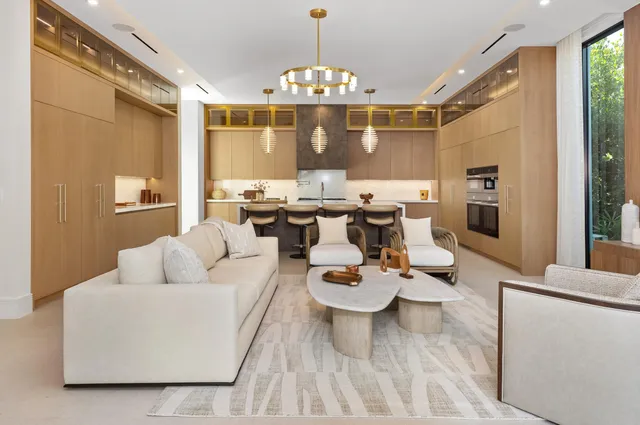 a bathroom with a granite countertop sink mirror and bathtub
