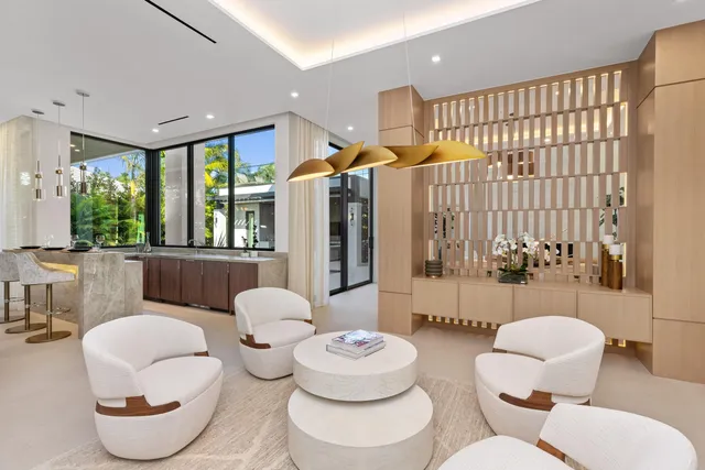 a front view of a house with a yard and a garage